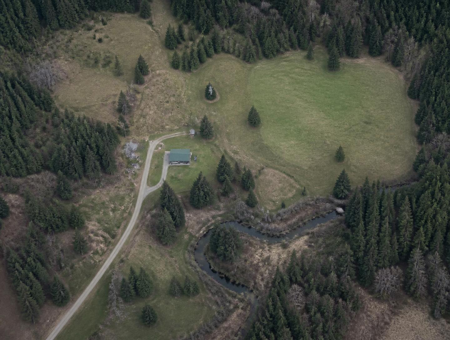 Aerial view of a rural parcel with surrounding recorded wells